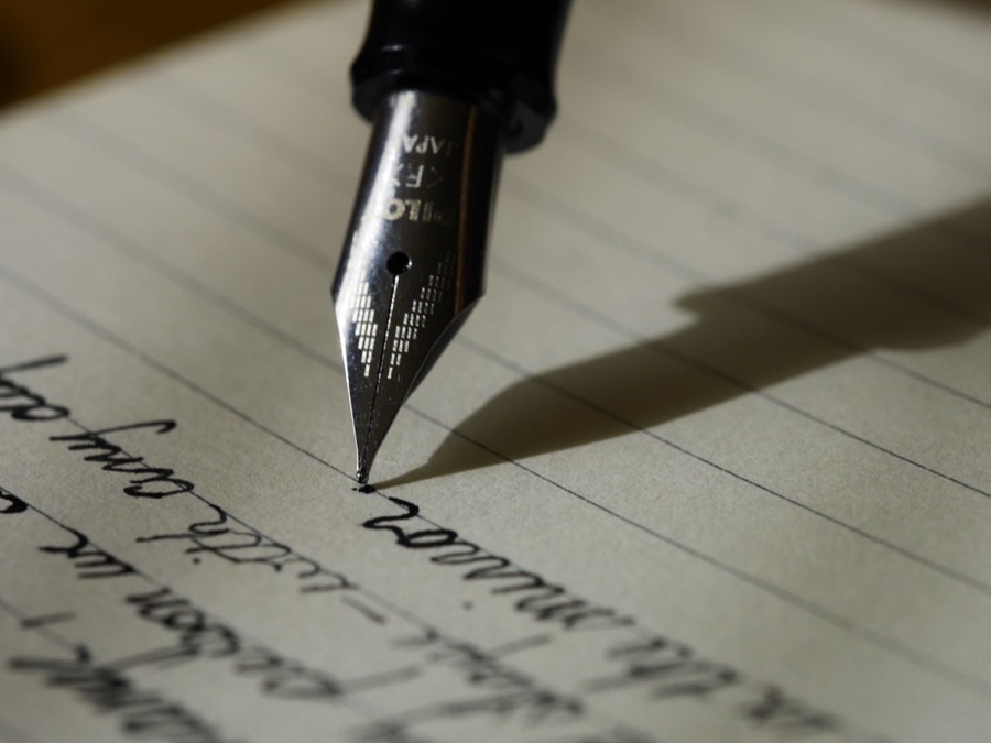 Writing a letter with a fountain pen